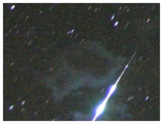 Brian Emfinger photographed this early Perseid meteor shower fireball, with a smoke trail, from Ozark, Arkansas just after midnight on Sunday, July 26, 2009.