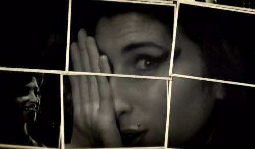 In the short video compilation before Bruno Mars' performance, we see Winehouse hiding one eye, then another.