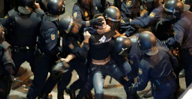 Spain’s police state has spiraled out of control as riot police are now running throughout the streets beating everyone in sight, men and woman, young and old.