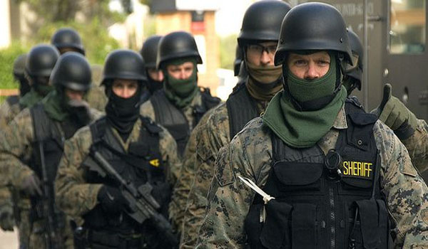 Militarized police gone wild across America; terrorizing citizens, shooting pet dogs