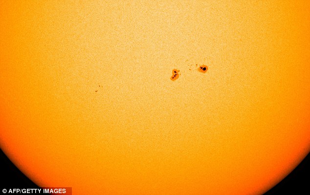 Massive sunspot that has DOUBLED in size in recent days could send solar storms careering toward Earth