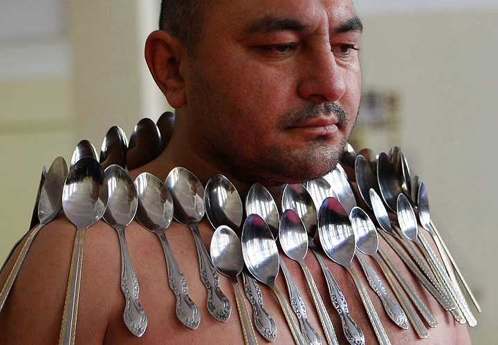 ‘Magnetic’ Georgian man sticks 50 spoons to his body