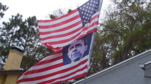 The Obama Flag: Who Decided That It Was Okay To Replace The Stars On The American Flag With The Face Of Barack Obama?