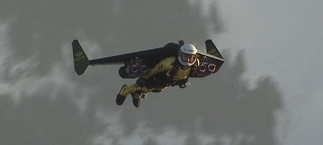 You WILL believe a man can fly: Video of daredevil pilot in a 125mph jet-powered ‘wing suit’ looping the loop over the Alps