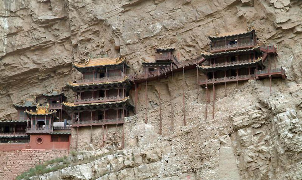 On a wing and a prayer: The extraordinary hanging monasteries that cling to the sides of cliffs