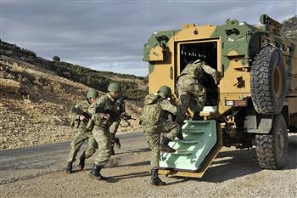 Furious Turkey mobilizes tanks, troops to Syrian border