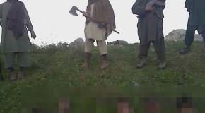 Horrific picture shows armed Taliban militants lording it over 12 decapitated heads of Pakistani ‘soldiers’