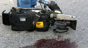 Israeli soldiers assault two Reuters cameramen