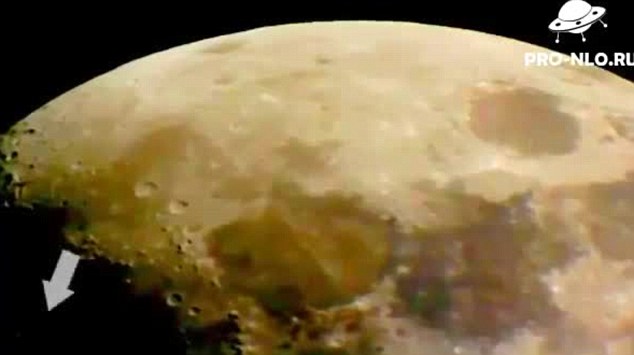 An encounter on the dark side of the moon 'UFO' spotted soaring above lunar surface in online video