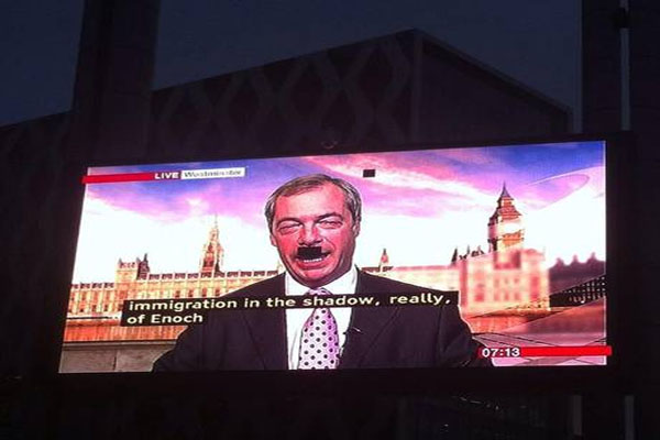 Unfortunate BBC moustache for Nigel Farage