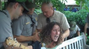 Woman violently arrested for playing banjo in wrong place at Syria war protest in Philly