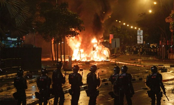 Singapore shocked by worst riots in decades, as migrant workers vent anger