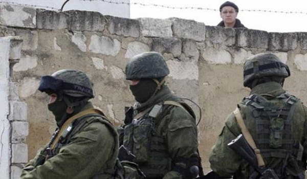 Unidentified gunmen seize military post in Crimea