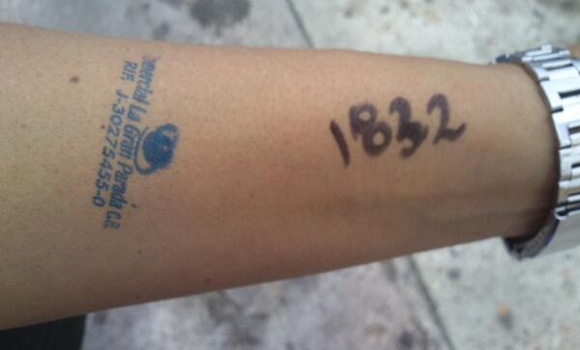 Venezuelans Are Marked With Numbers To Stand In Line At Government Supermarkets