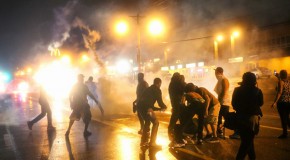 Indefinite curfew: Ferguson police deploy tear gas against protesters