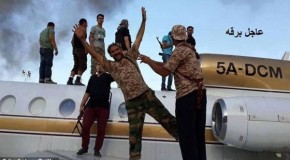 Pictured: Libyan Islamist rebels pose with planes seized from Tripoli airport as U.S. officials warn they could be used to carry out terrorist attack on 9/11 anniversary