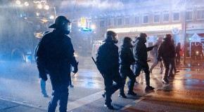 Now ISIS clashes spread across Europe: Riot police separate hundreds of Kurds and Islamist supporters in Germany after at least nine are killed in protests in Turkey