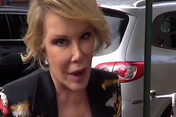 Joan Rivers Reemerging After faking Death, PROVES Michelle Obama is a Man