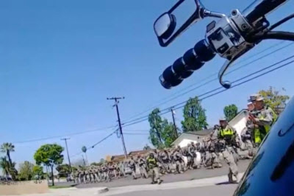 Video: Armed National Guard Troops Patrol Residential Streets in California