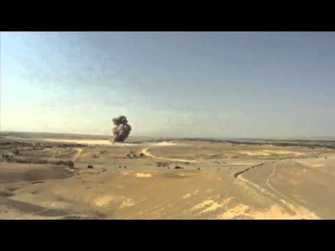 ISAF clearing charges destroying insurgent IEDs , in southern Helmand province
