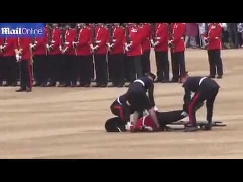 Guardsman carried off in stretcher after collapsing at ceremony