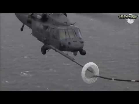 HELICOPTER  AIR REFUELING / UH 60 Black Hawks Mid Air Refuelings In Rough Conditions