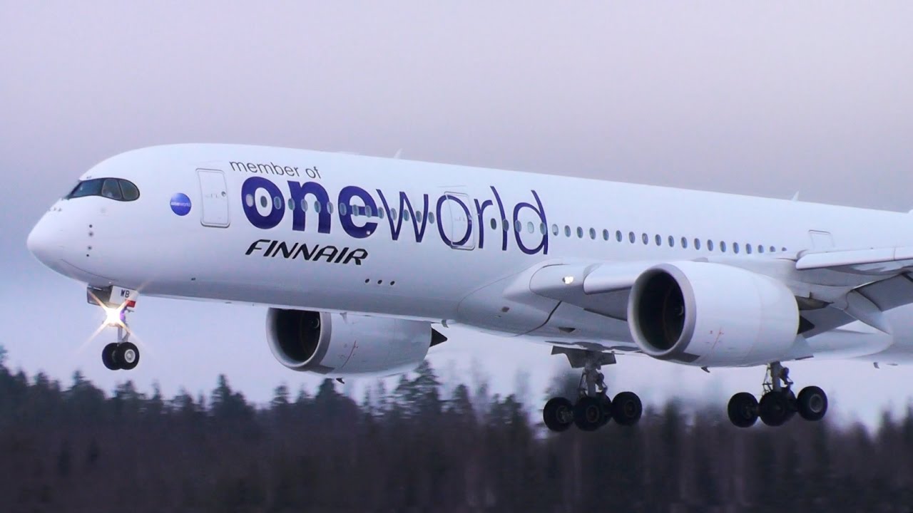 ONEWORLD A350 and A340 snowy arrivals at Helsinki Airport