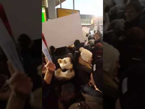 Protest against Muslim ban happening now at JFK Terminal 4 arrivals